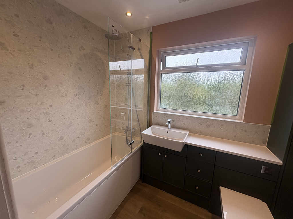 Professional bathroom fitter completing small bathroom in Preston